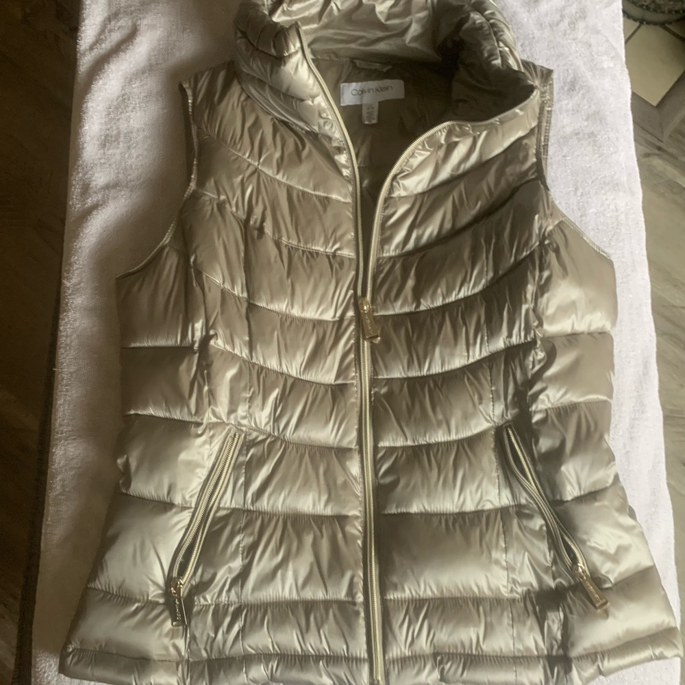 Gold Calvin Klein puffy vest